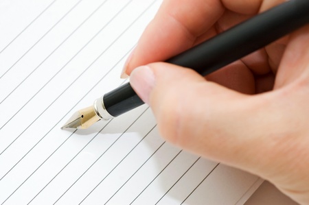 A fountain pen and a documentの写真素材