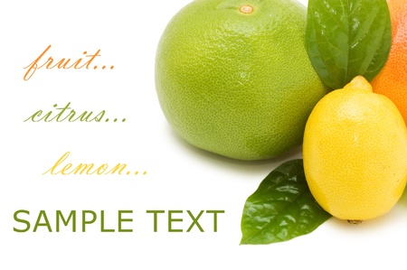 Fresh juicy grapefruits with green leafs. Isolatedの写真素材