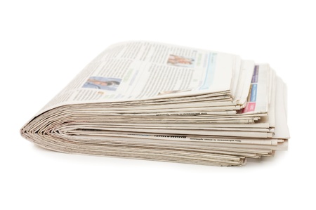 Various newspapers over white backgroundの写真素材