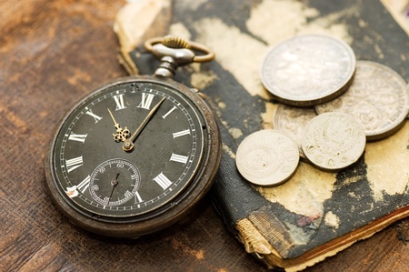 The old book, old watch and money の写真素材