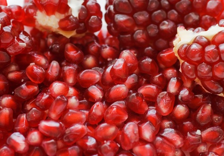 Macro of peeled ripe seeds pomegranateの写真素材