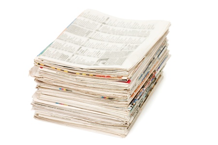 Various newspapers over white background の写真素材