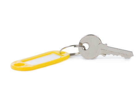 Key with label isolated on white backgroundの写真素材