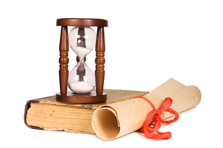 Hourglasses and book isolated on white backgroundの写真素材