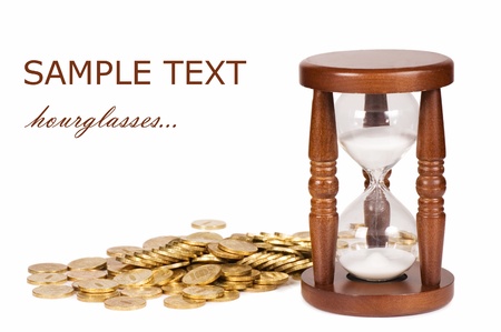 Hourglasses and coin isolated on white backgroundの写真素材