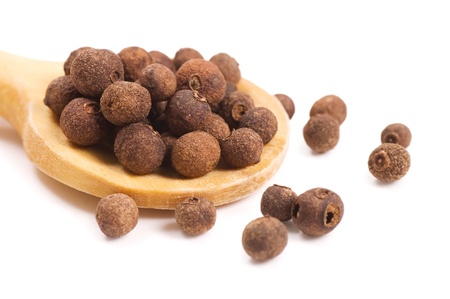 Fragrant Peppercorns on a wooden spoonの写真素材