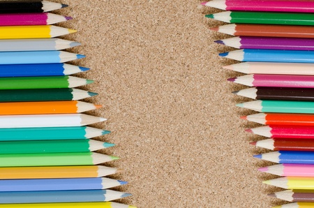 Colour pencils on ñorkboardの写真素材