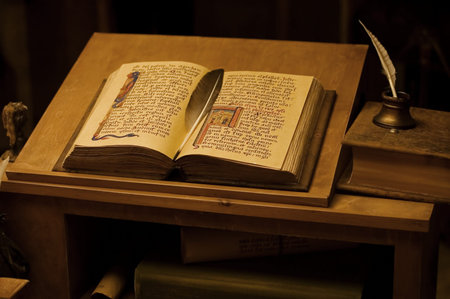 Table with the ancient book. vintage