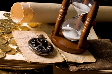 The hourglass and the bookの写真素材