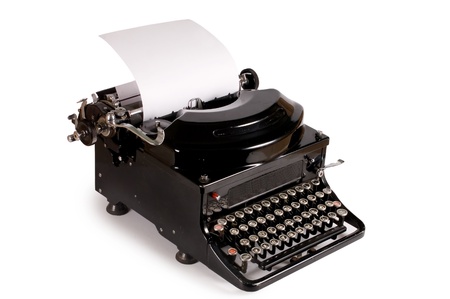 Old typewriter isolated on white backgroundの写真素材