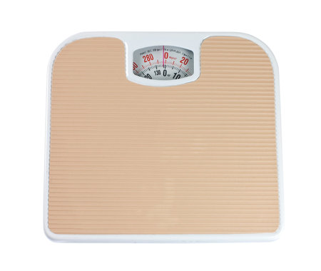 Close up of scale on whiteの写真素材