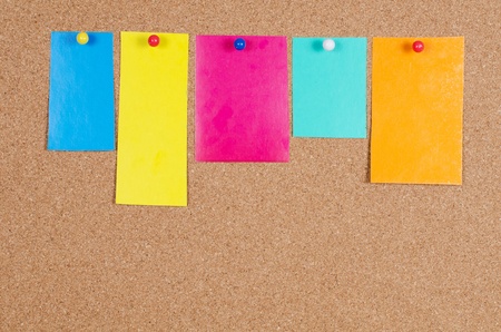 collection of note papers on corkboardの写真素材