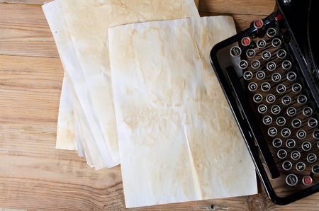 Old paper on a wooden surfaceの写真素材