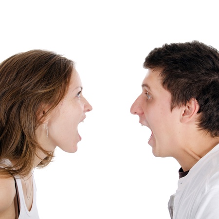 Beautiful young pair swear isolated on whiteの写真素材