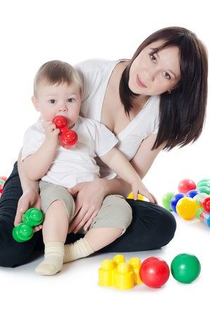 The little boy plays with mum isolatedの写真素材