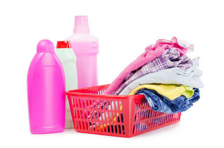 Heap of pure clothes with washing-up liquidsの写真素材