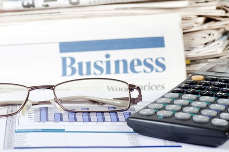 Business the newspaper with chartの写真素材