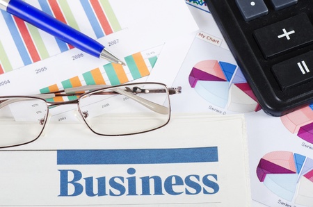 Business the newspaper with chartの写真素材