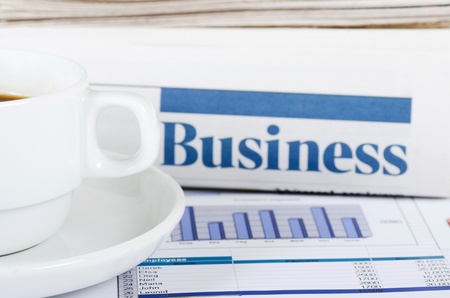 Coffee and the fresh newspaper - morning of the businessmanの写真素材