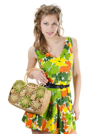 The beautiful girl in summer dress isolatedの写真素材