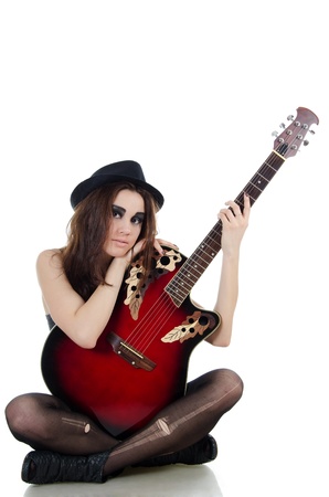 Girl with a guitar - grunge styleの写真素材