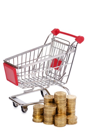 Shopping cart and coins isolated on whiteの写真素材