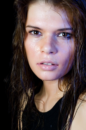 The wet girl with the spread cosmeticsの写真素材
