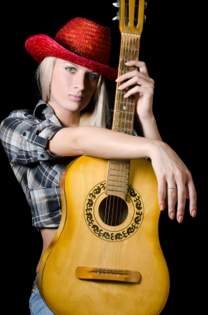 The beautiful girl in a cowboy's hatの写真素材