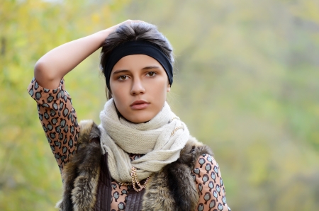 Portrait of the young girl on natureの写真素材