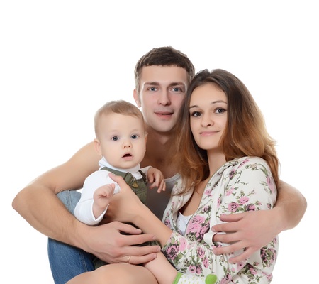 Portrait of young happy family with babyの写真素材