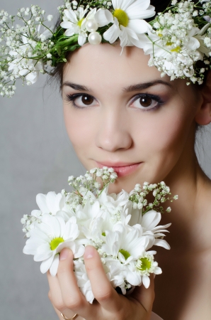Portrait of girl with flowers in hairの写真素材