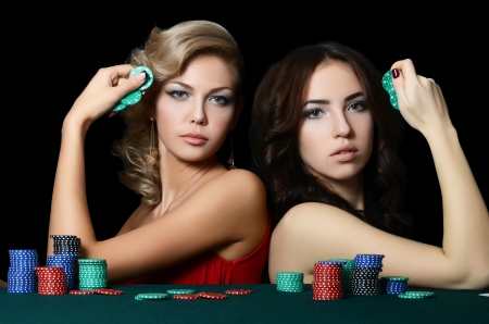 Beautiful woman with casino chips a blackの写真素材