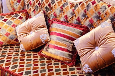 Beautiful pillows on a magnificent sofaの写真素材