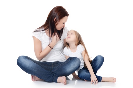 Mum with a daughter isolated on white backgroundの写真素材