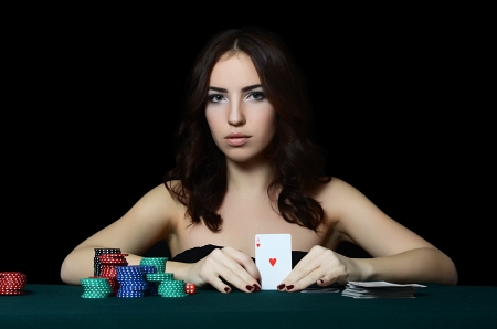 Beautiful woman with casino chips a blackの写真素材