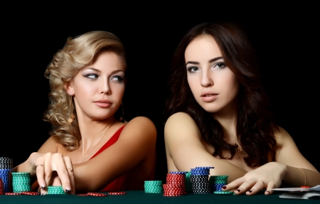 Beautiful woman with casino chips a blackの写真素材
