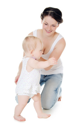 The happy mother with baby over whiteの写真素材