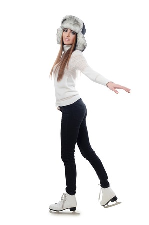 The beautiful woman on ice skates isolatedの写真素材