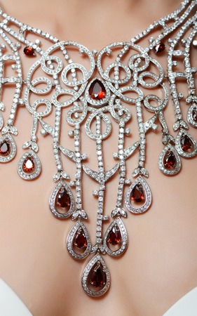 The beautiful woman in expensive pendant close-upの写真素材