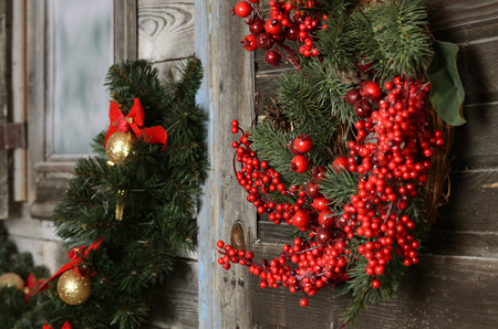 Christmas branch of a fur-tree on wallの写真素材