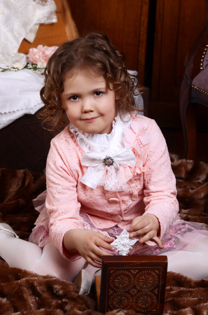 The little girl in  an vintage interiorの写真素材