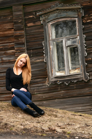 The beautiful woman at the old houseの写真素材