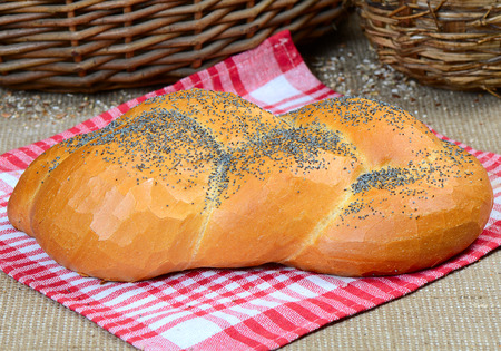 bread, wheaten long loaf with poppyの写真素材
