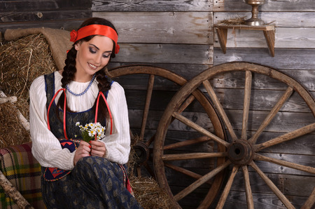 Beautiful woman portrait in russian style. Beautiful Russian girl in traditional dress. Russian style.の写真素材