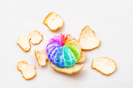 colored mandarin orange on white backgroundの写真素材