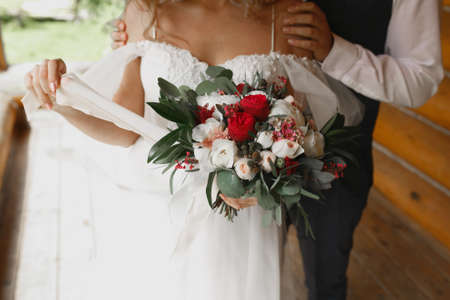 Bouquet in the hands of the bride.の写真素材