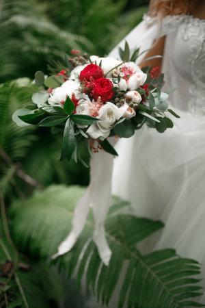 Bouquet in the hands of the bride.の写真素材