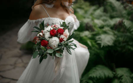 Bouquet in the hands of the bride.の写真素材
