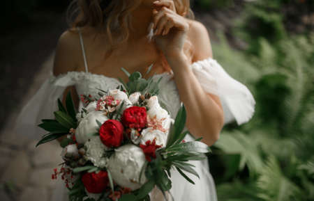 Bouquet in the hands of the bride.の写真素材
