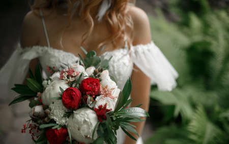 Bouquet in the hands of the bride.の写真素材